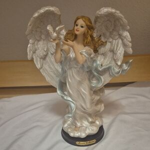 Angel Holding A Bird White & Blue